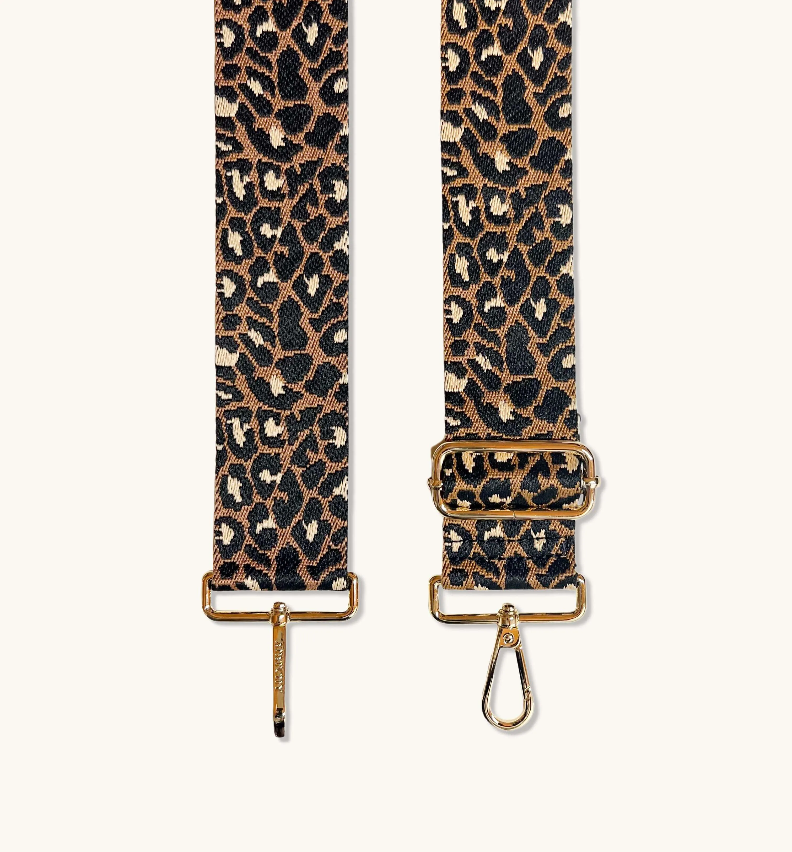 The Tassel Stone Leather Crossbody Bag With Tan Cheetah Strap