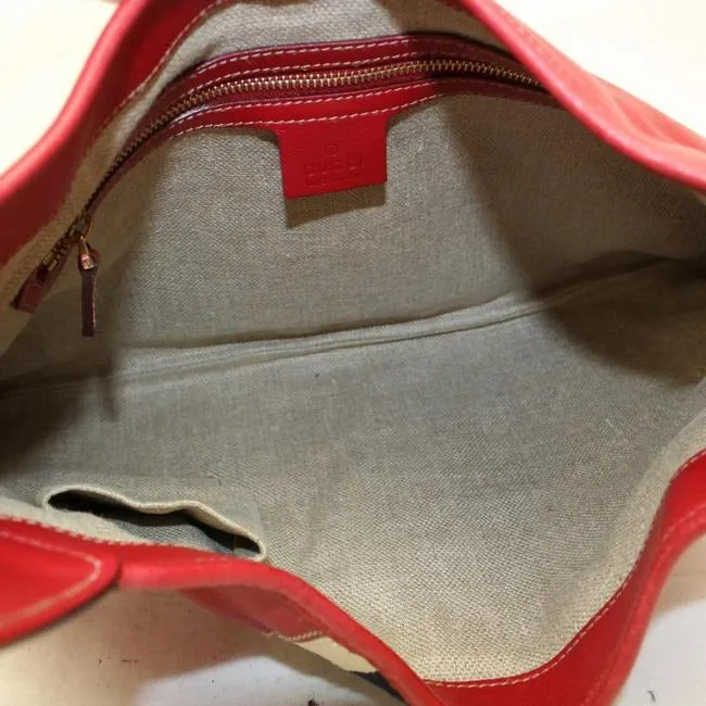 Vintage, Gucci, new Jackie style, red leather with a red, white, & blue center Sherry stripe, triangular shape, & gold hook closure