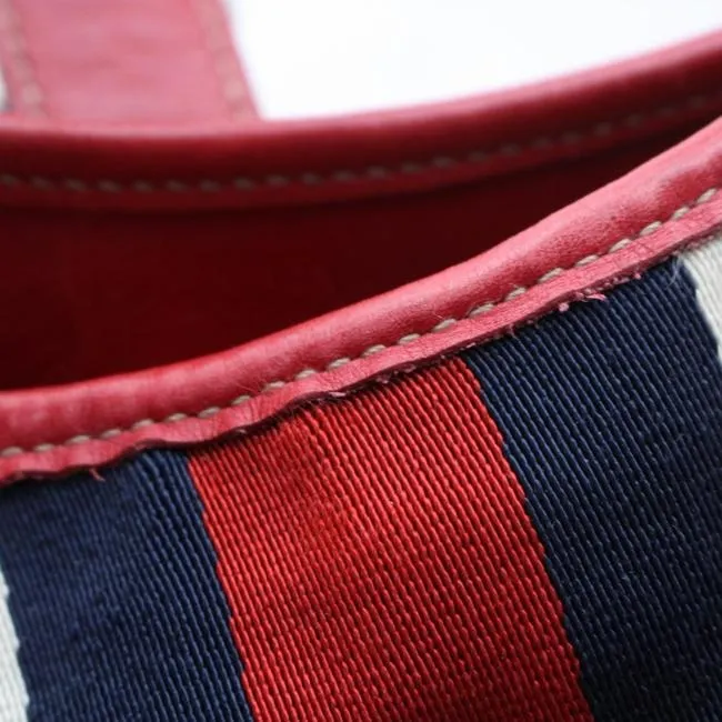 Vintage, Gucci, new Jackie style, red leather with a red, white, & blue center Sherry stripe, triangular shape, & gold hook closure